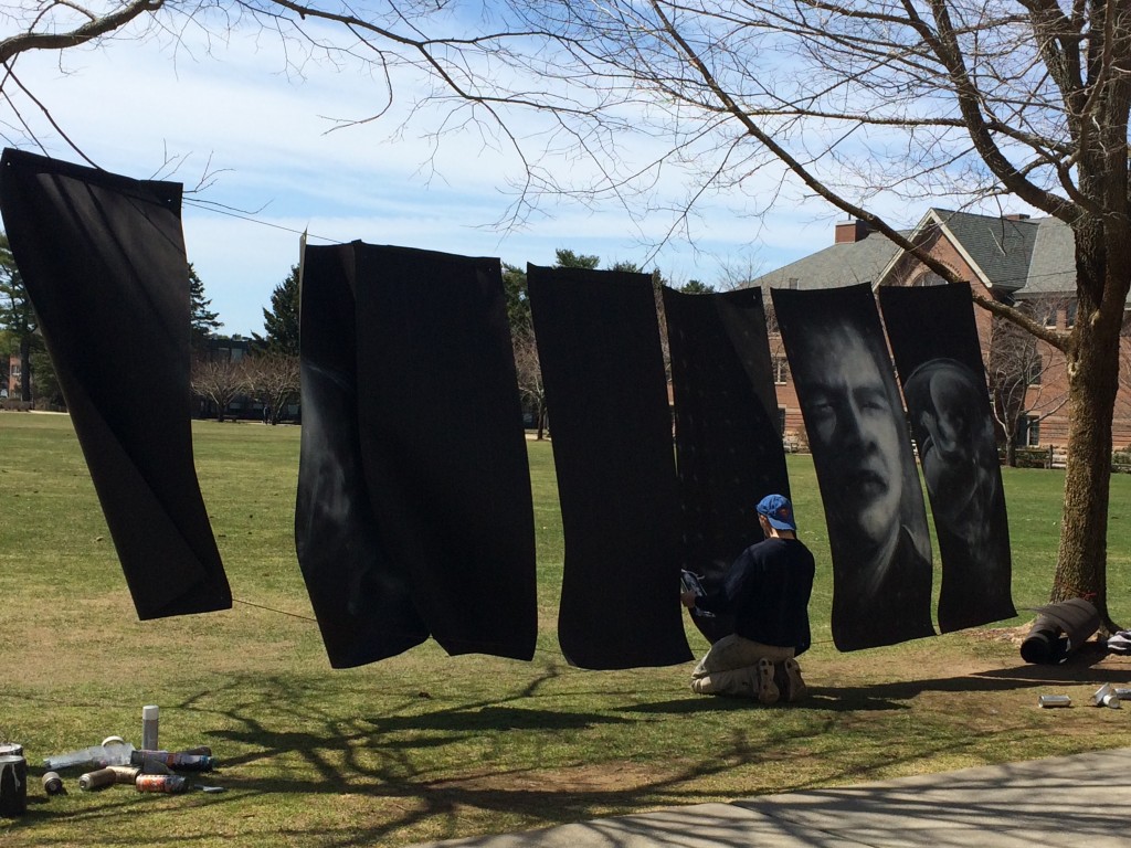 David Popa '15 in-process of "Lots of Things Have Changed," a live creation of a mural