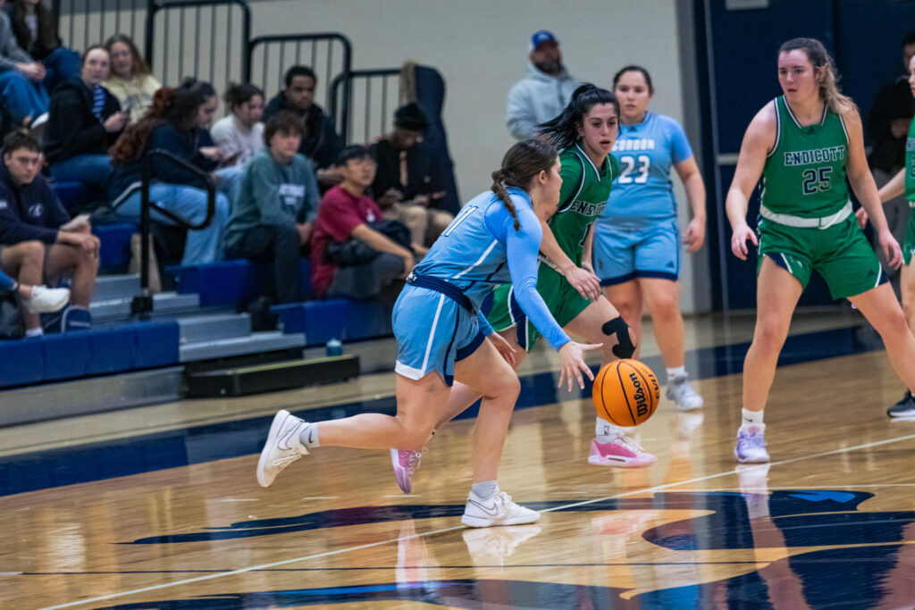 Nicholson plays against Endicott college athletes.