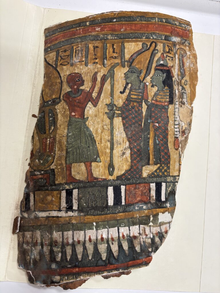 One of the Egyptian sarcophagi pieces in the Gordon College Archives.